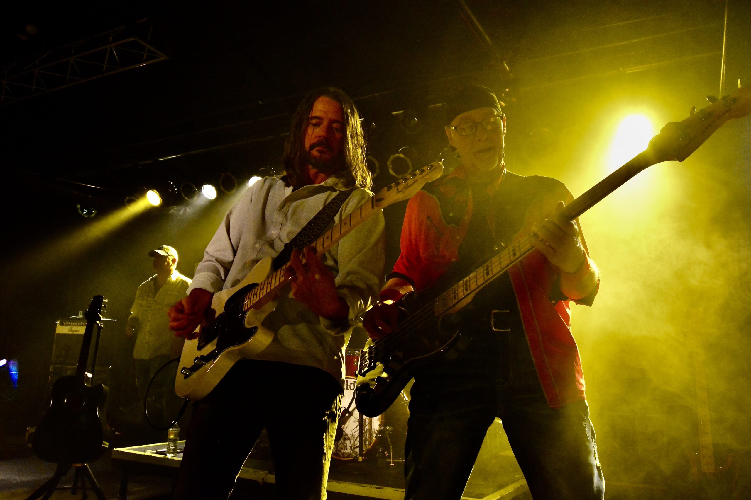 guitarists playing their instruments